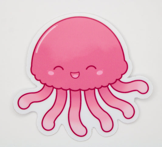 A cute pink jellyfish sticker with a smiling face and wavy tentacles, shown on a plain white background.